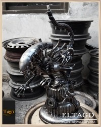 Recycled Metal Crouching Monster On Pillar